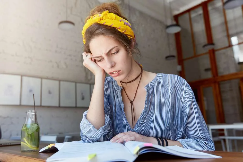Medical student studying with First Aid